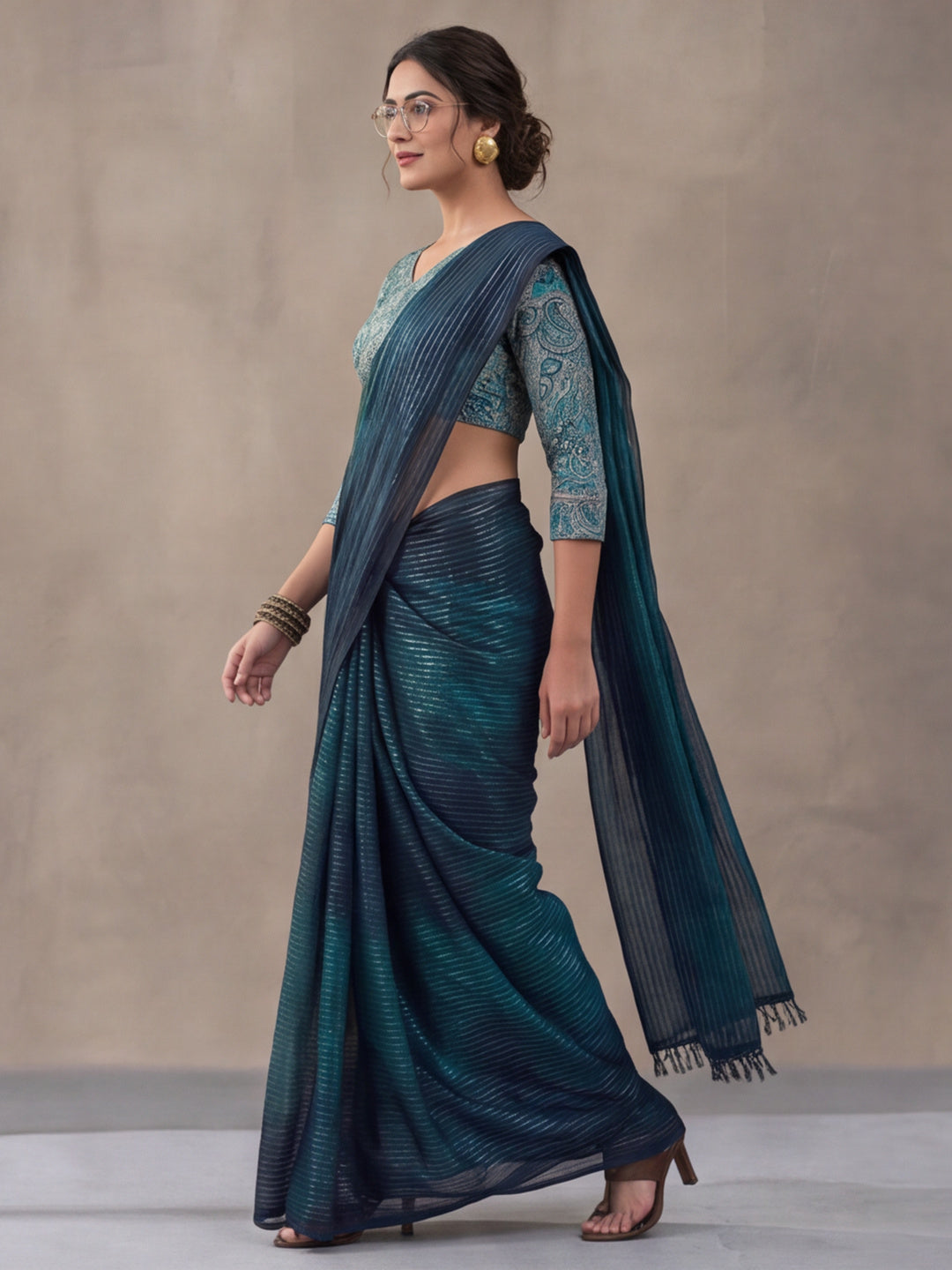 Women's Teal Sparkle Lining Fabric Saree with Bold Prints by Jaipur Kurti