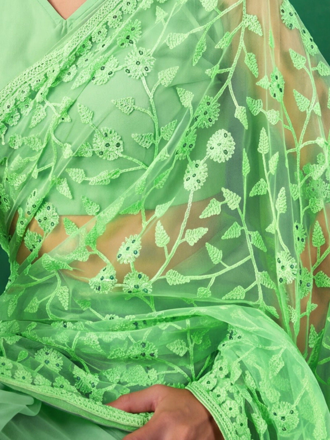 Pastel Green Work Net Saree with Floral Design
