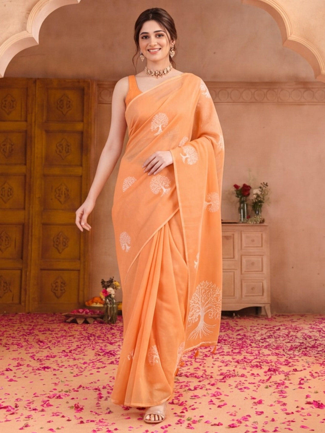 Women Peach Ethnic Tree Print Saree with Tassel Pallu and Artistic Design