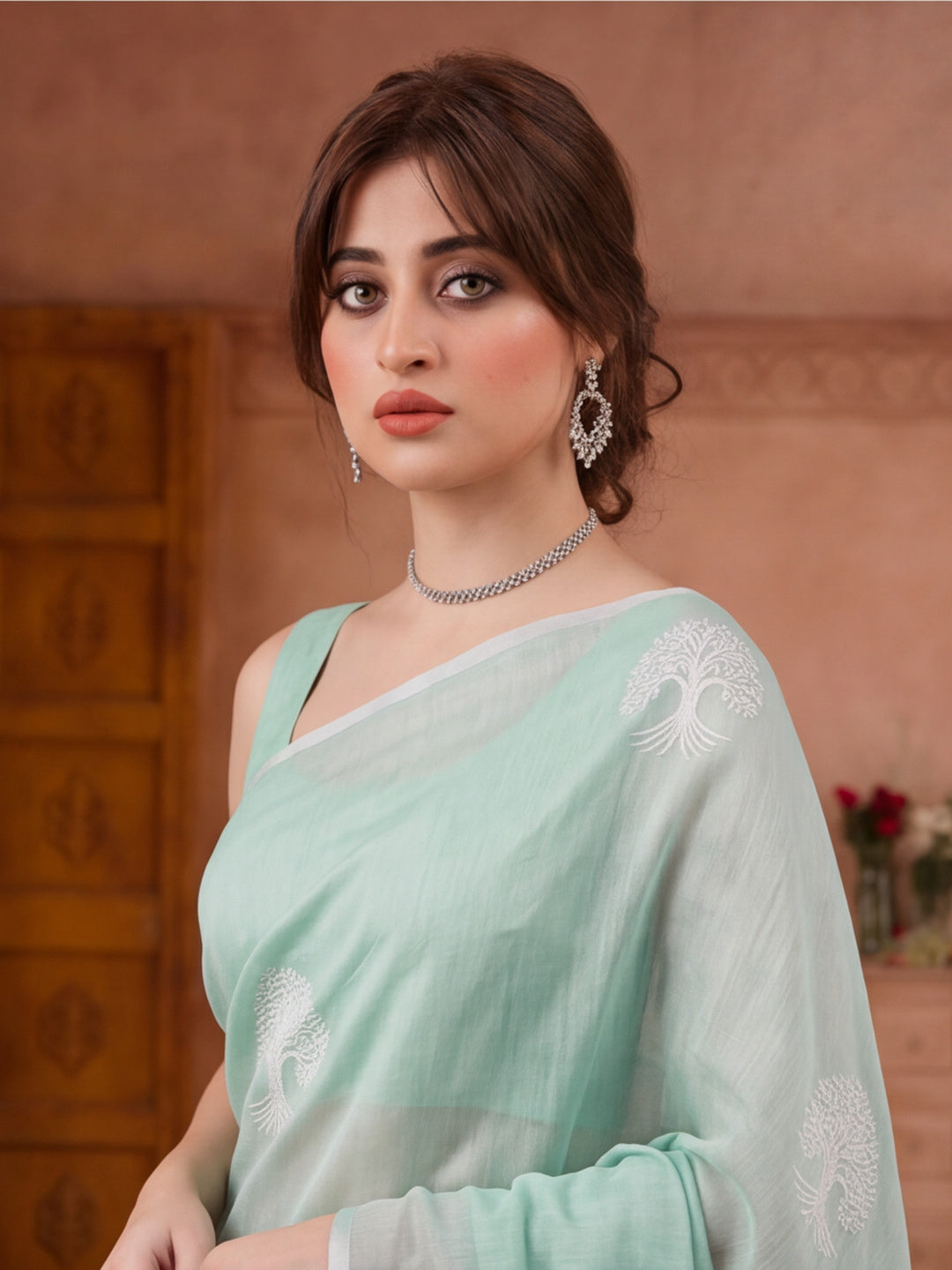 Women Sea Green Ethnic Tree Print Saree with Tassel Pallu and Artistic Design