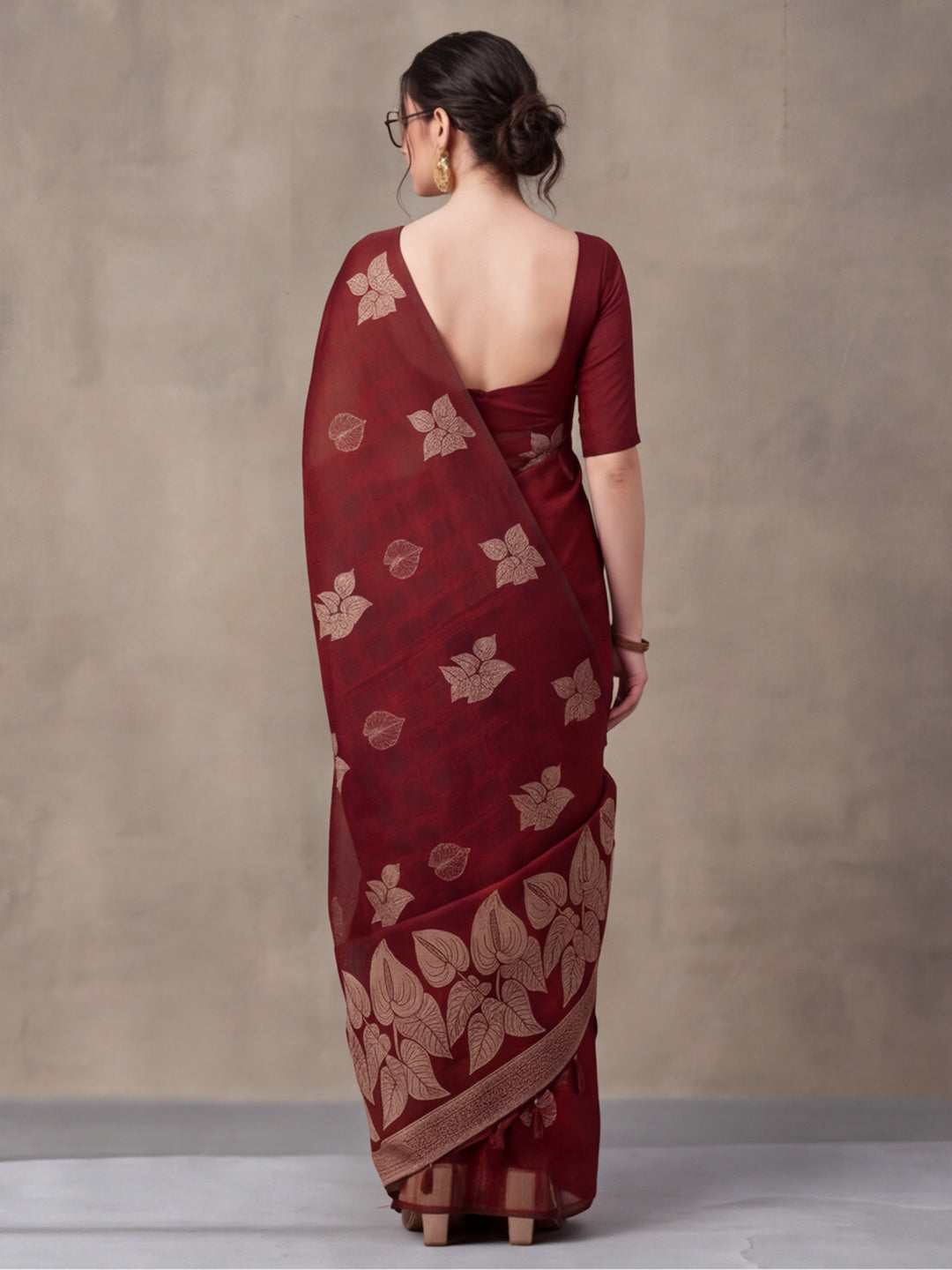 Women Maroon Leaf Motif Woven Saree with Tassel Detail Pallu