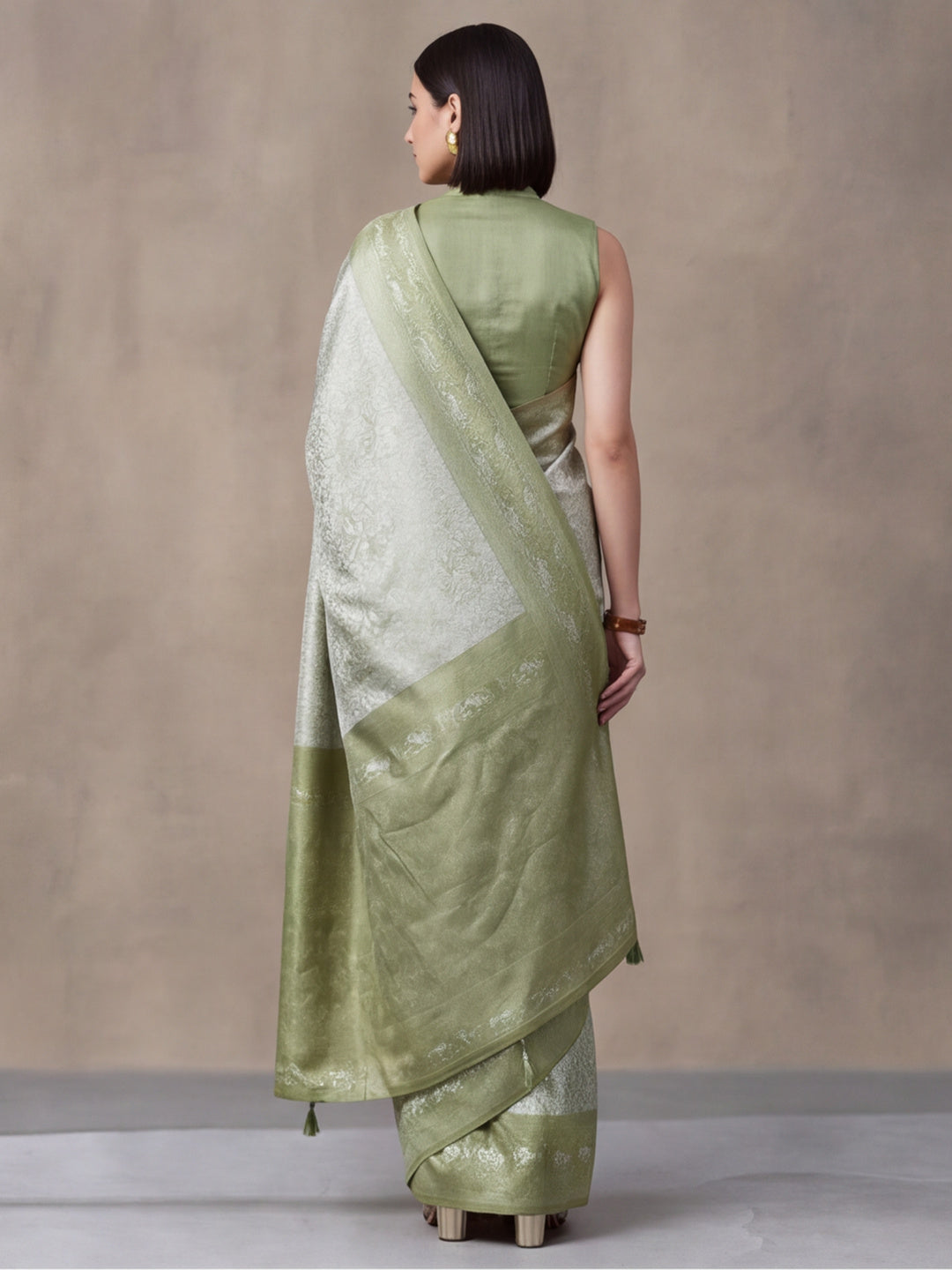 Women Sage Green Jacquard Woven Saree with Rich Ethnic Border and Tassel Detail