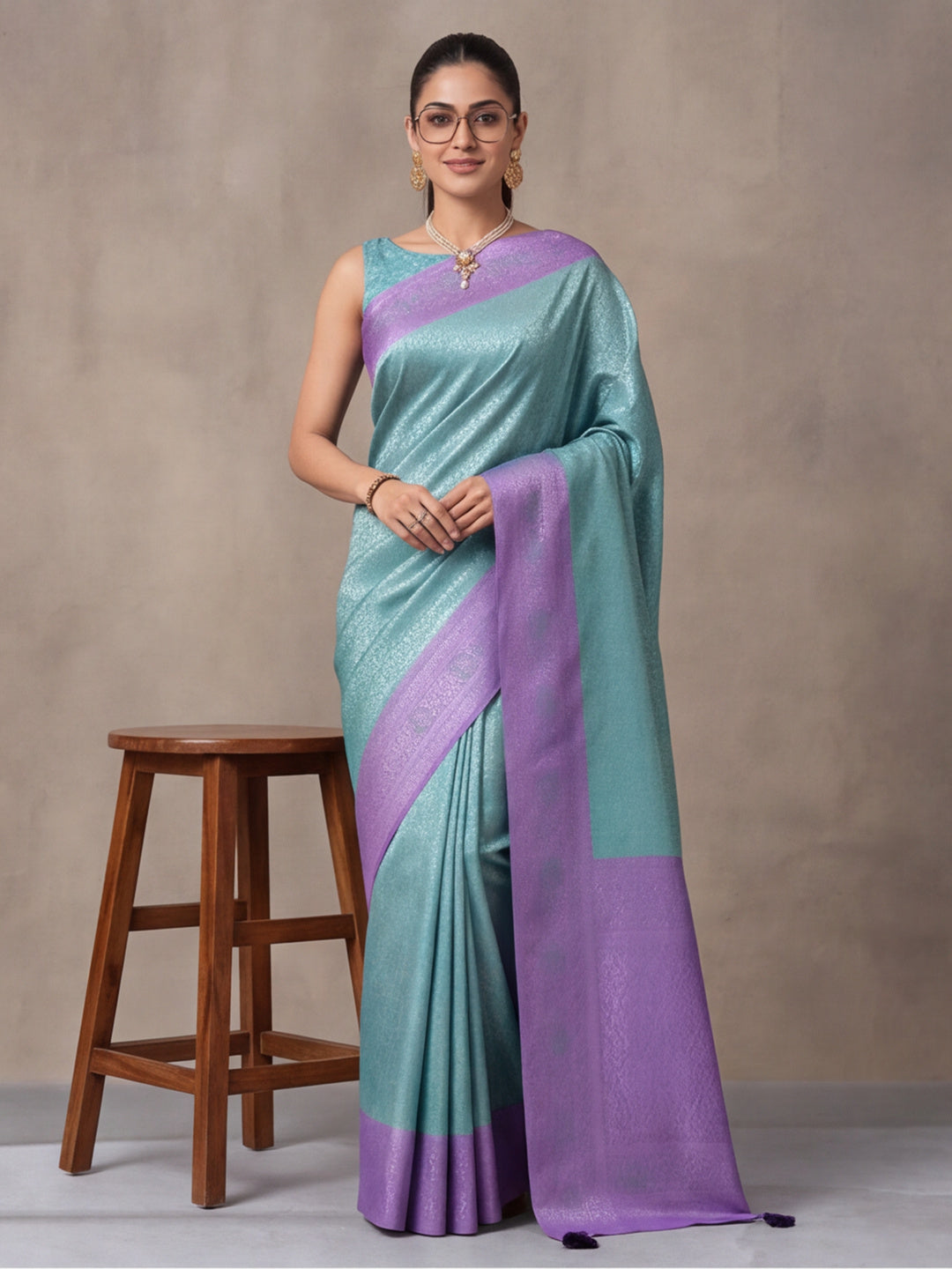 Women Sea Green Jacquard Woven Saree with Rich Ethnic Border and Tassel Detail