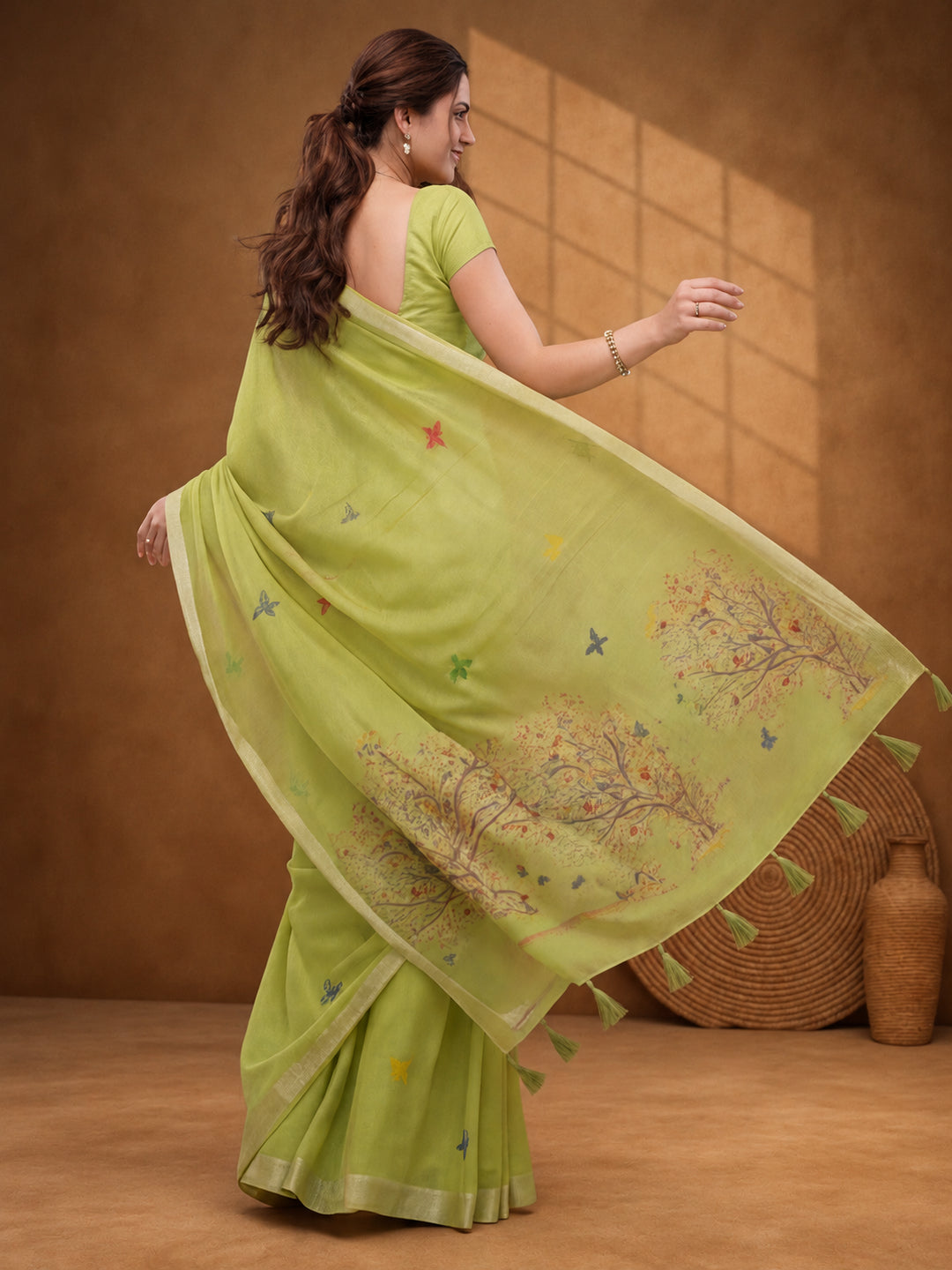 Women Green Designer Weaving Work Saree with Tree Motif Pallu and Tassel Detail
