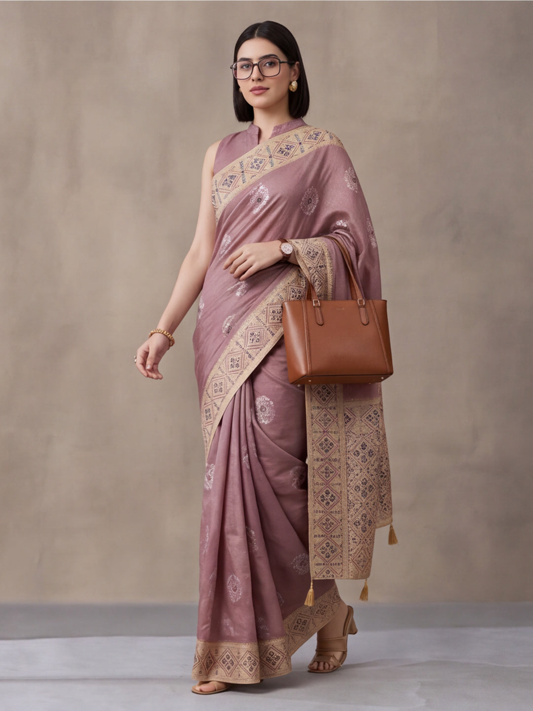 Women Mauve Banarasi Silk Blend Saree with Ethnic Woven Border and Tassel Detail