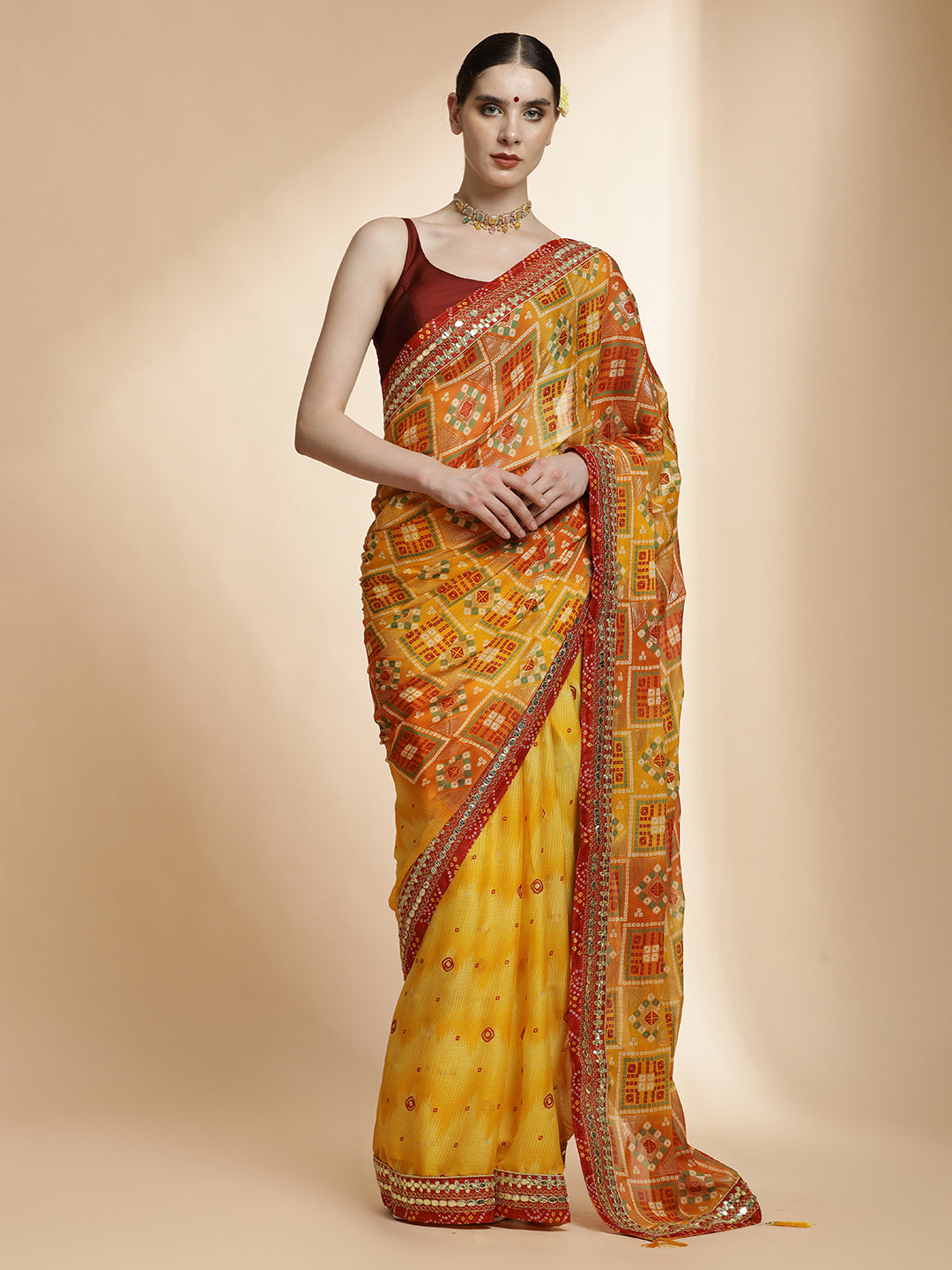 Festive Yellow Bandhani Embroidered Pure Georgette Saree