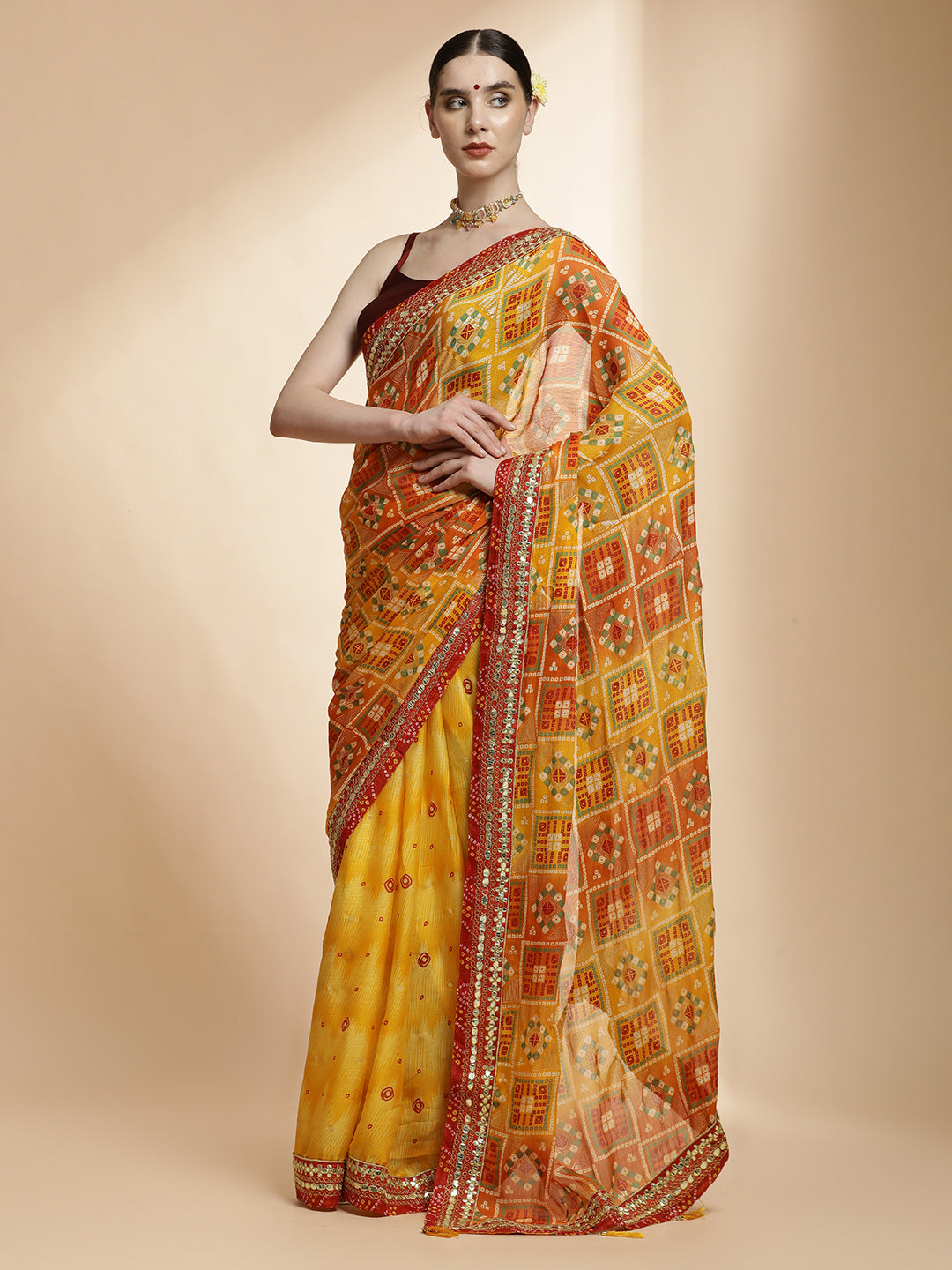 Festive Yellow Bandhani Embroidered Pure Georgette Saree