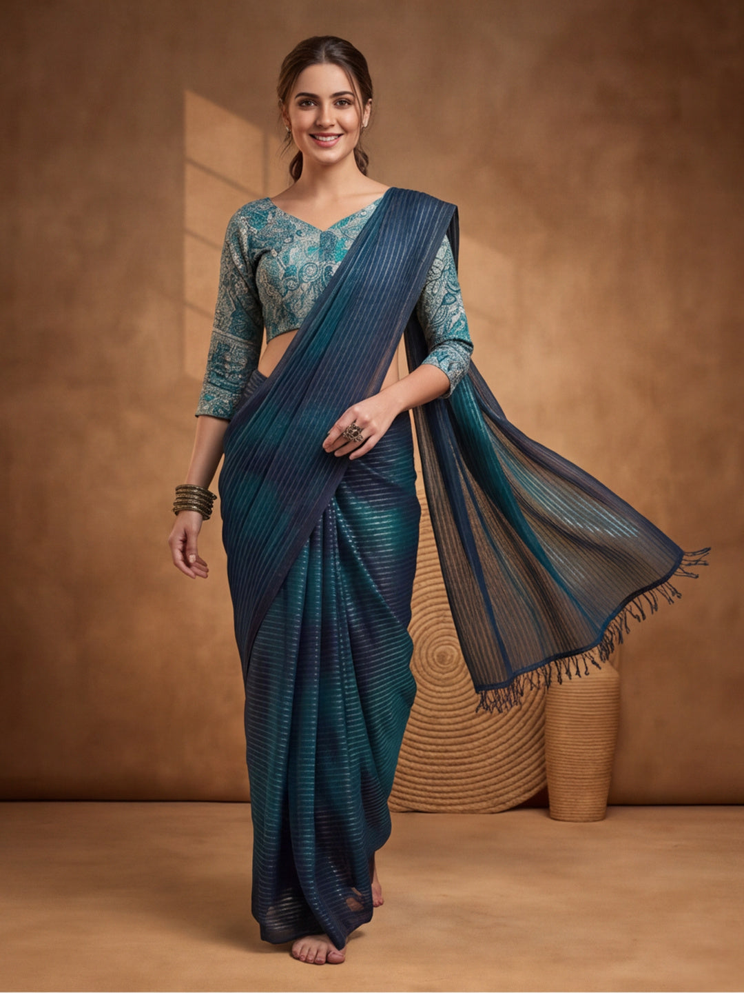 Women's Teal Sparkle Lining Fabric Saree with Bold Prints by Jaipur Kurti