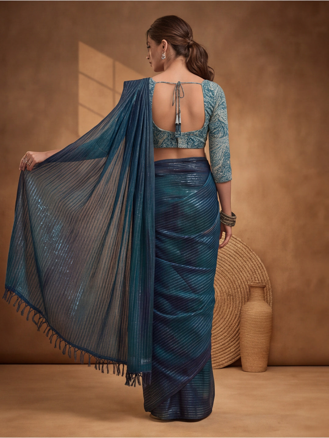 Women's Teal Sparkle Lining Fabric Saree with Bold Prints by Jaipur Kurti