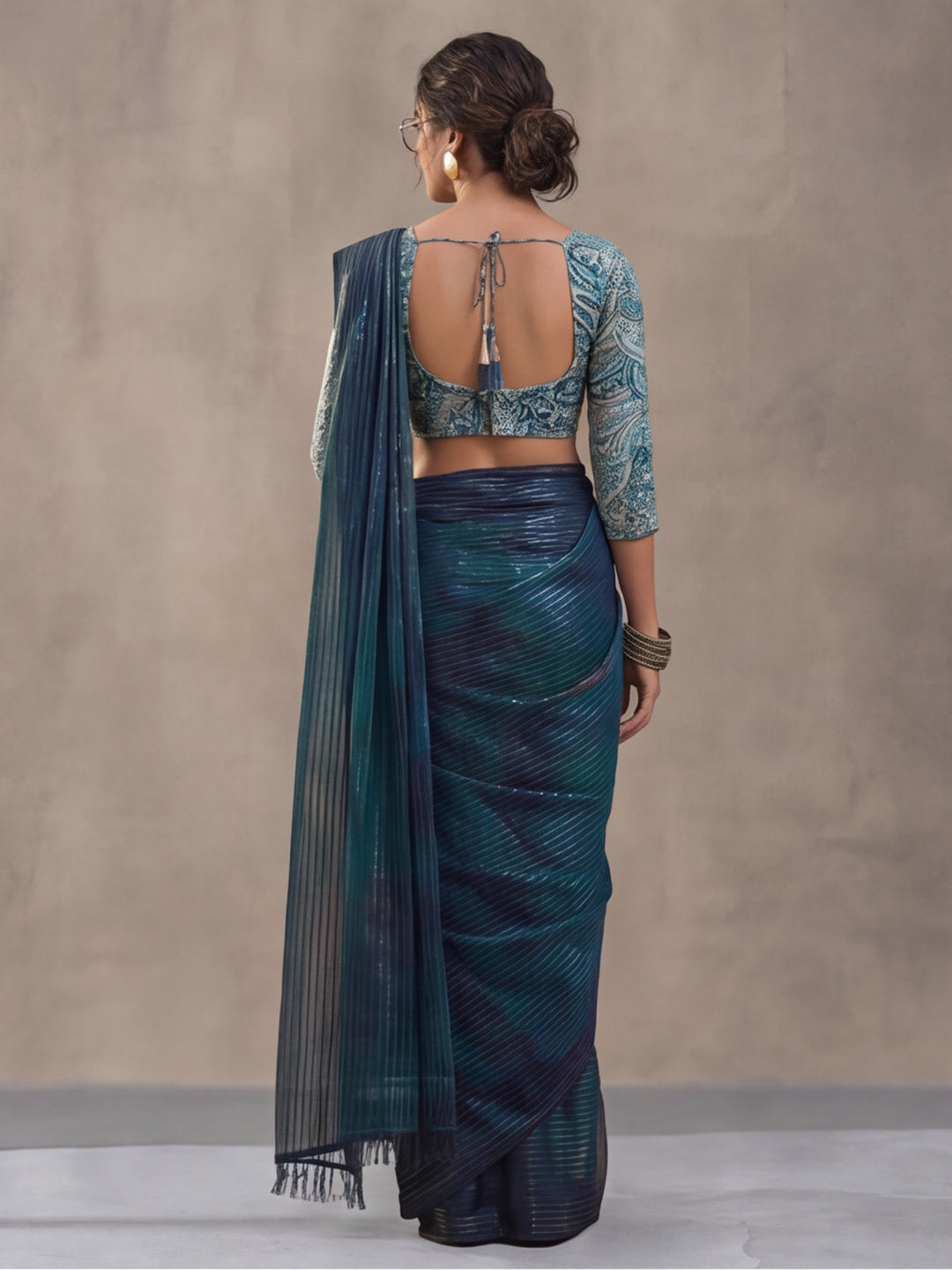 Women's Teal Sparkle Lining Fabric Saree with Bold Prints by Jaipur Kurti