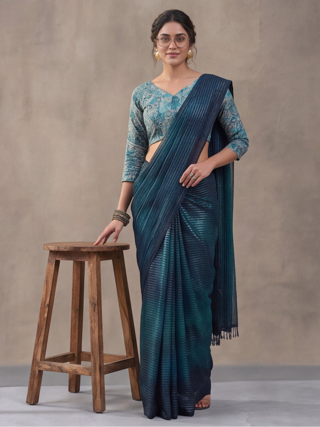 Women's Teal Sparkle Lining Fabric Saree with Bold Prints by Jaipur Kurti