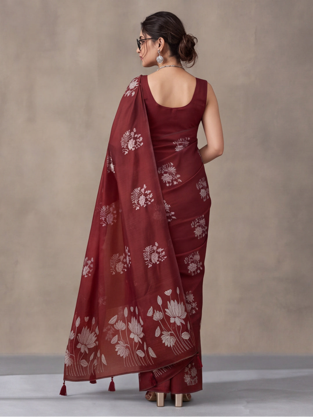 Women Maroon Floral Woven Design Saree with Tassel Detail Pallu
