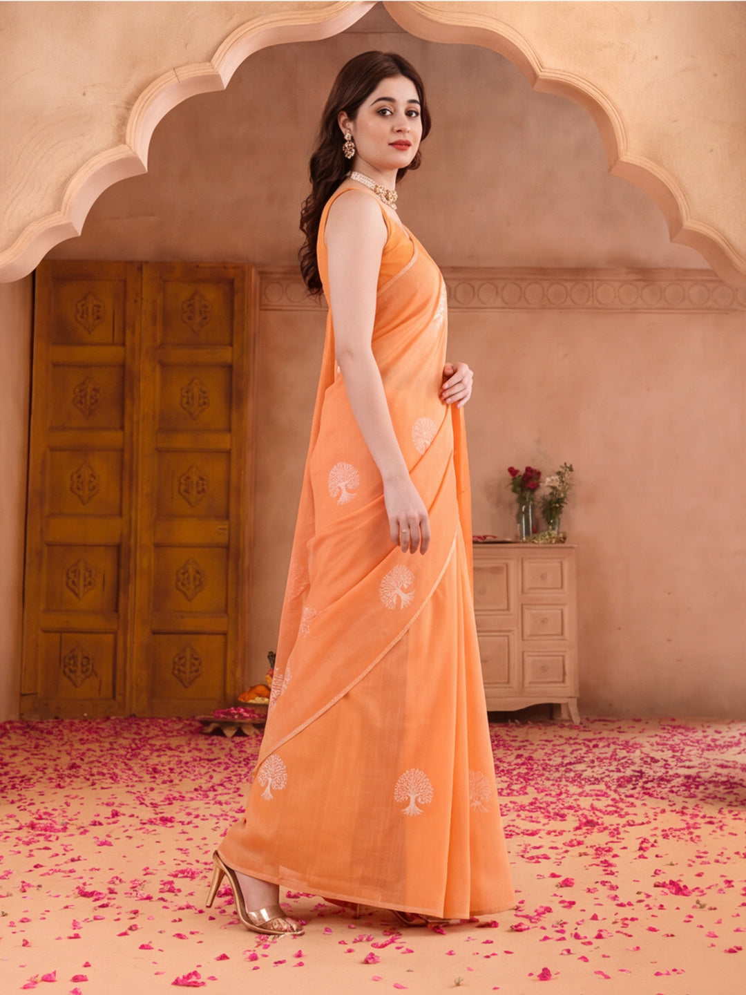 Women Peach Ethnic Tree Print Saree with Tassel Pallu and Artistic Design