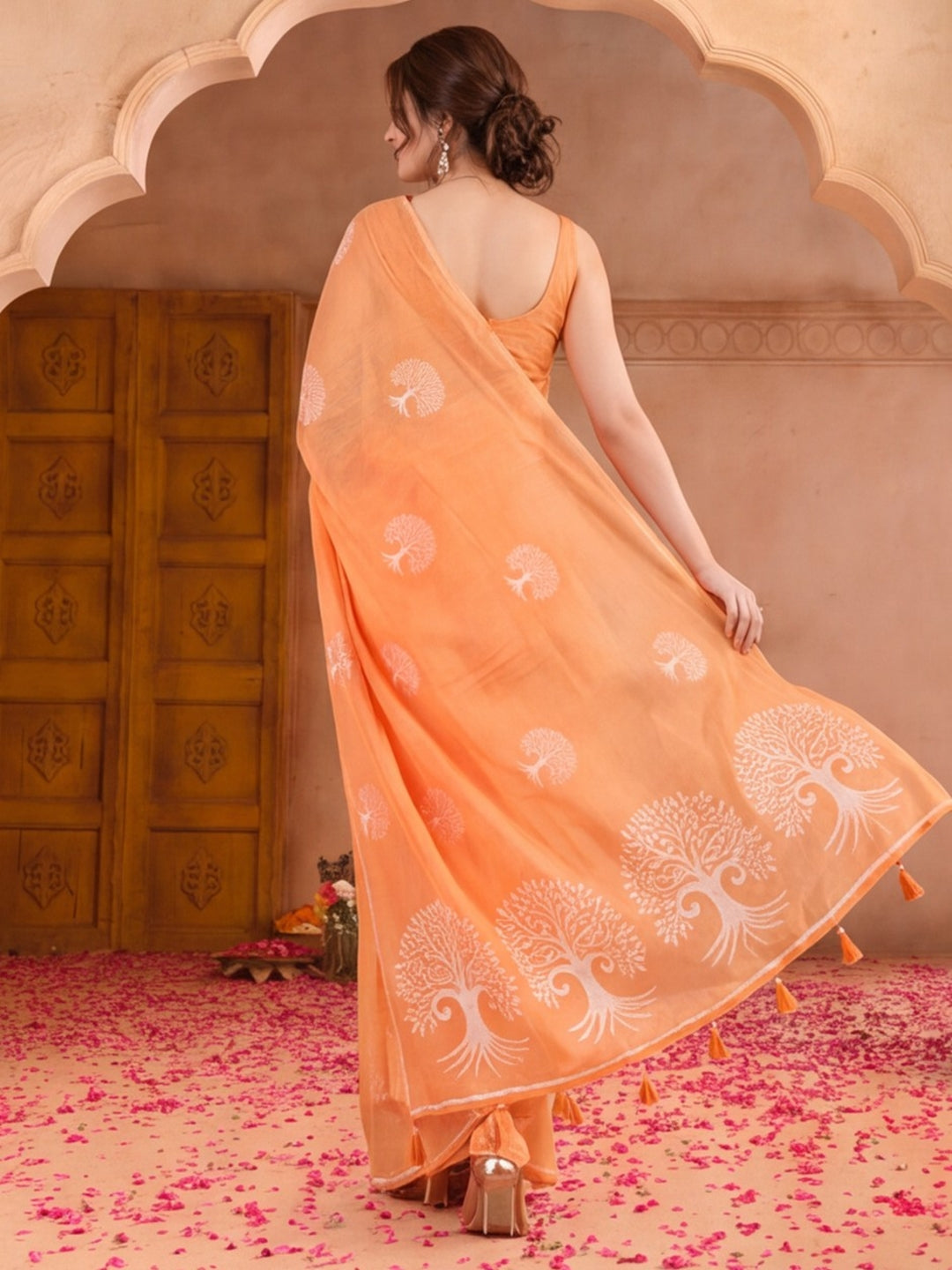 Women Peach Ethnic Tree Print Saree with Tassel Pallu and Artistic Design