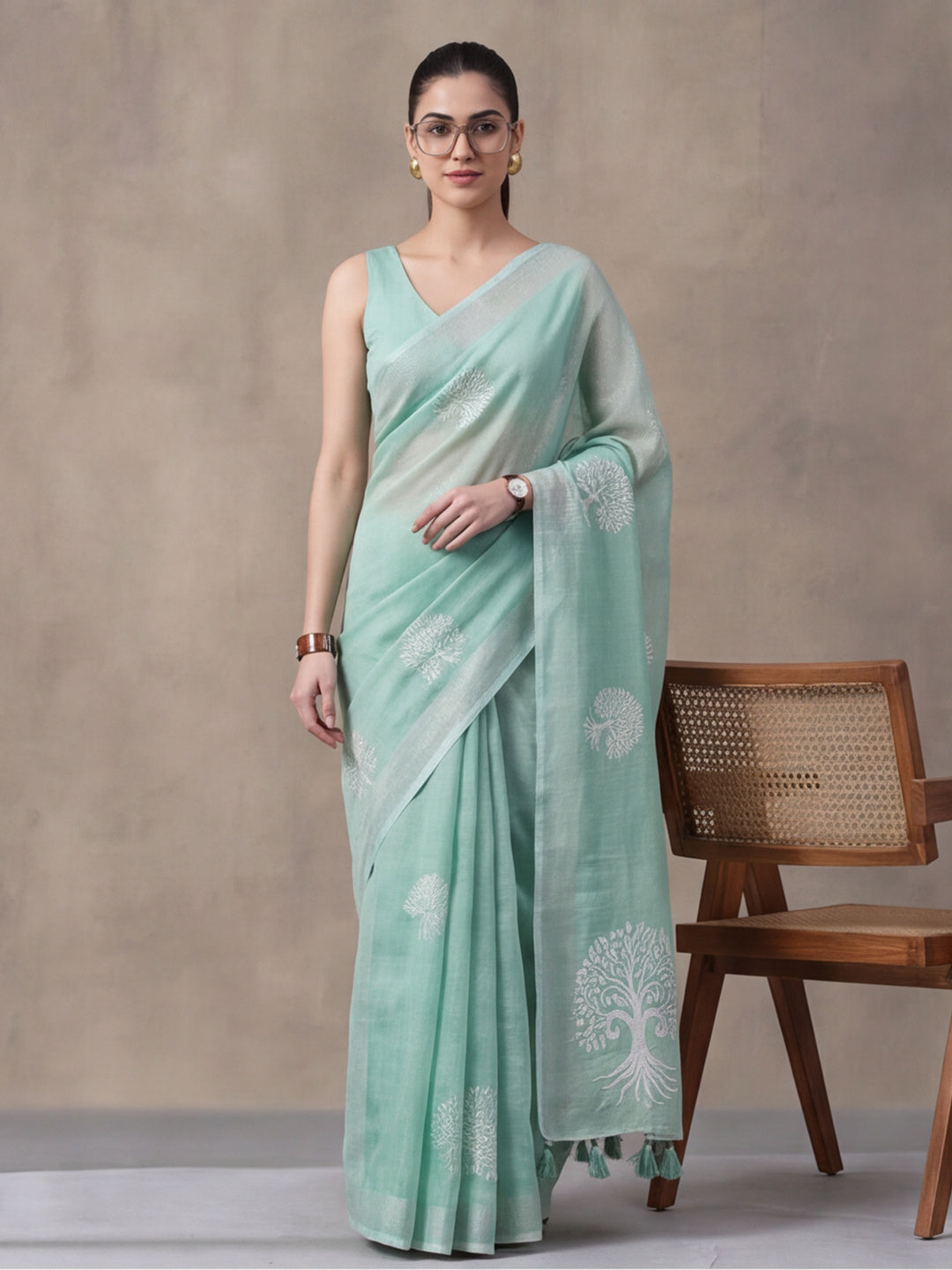 Women Sea Green Ethnic Tree Print Saree with Tassel Pallu and Artistic Design