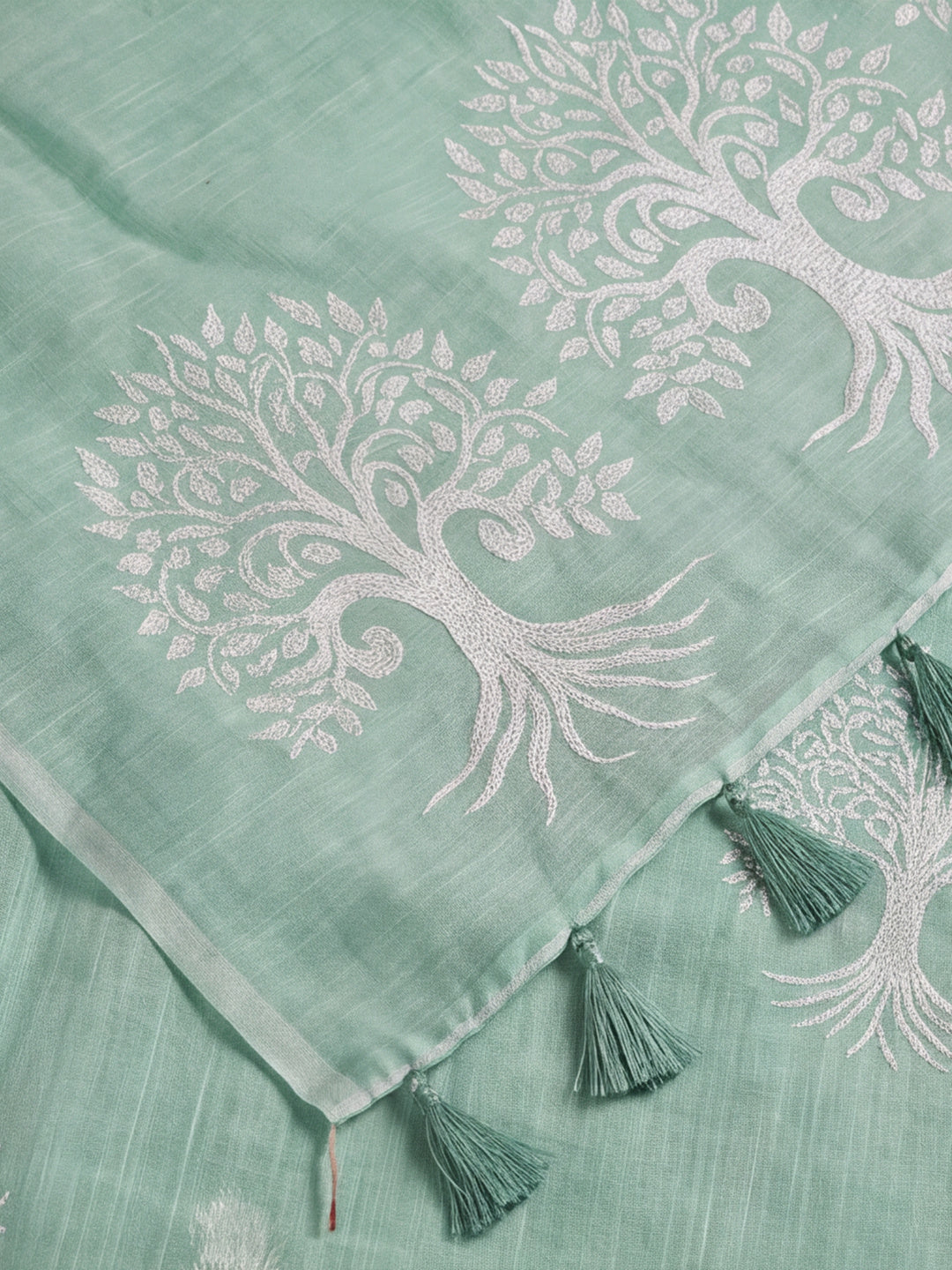 Women Sea Green Ethnic Tree Print Saree with Tassel Pallu and Artistic Design