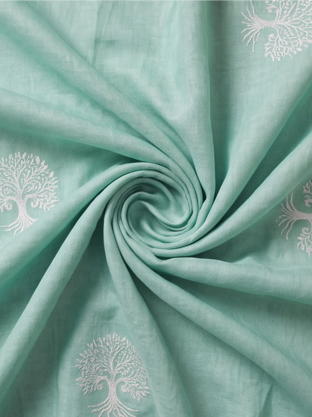 Women Sea Green Ethnic Tree Print Saree with Tassel Pallu and Artistic Design