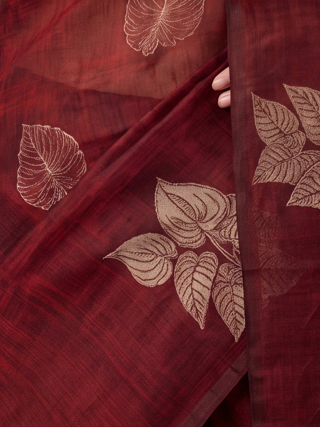 Women Maroon Leaf Motif Woven Saree with Tassel Detail Pallu