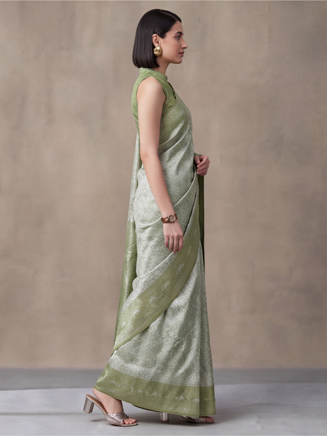 Women Sage Green Jacquard Woven Saree with Rich Ethnic Border and Tassel Detail