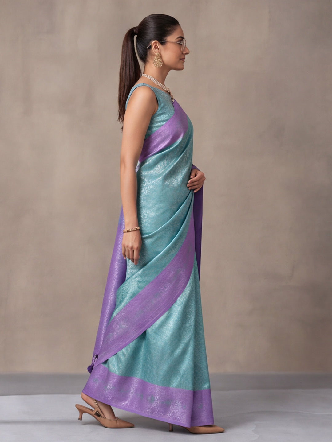 Women Sea Green Jacquard Woven Saree with Rich Ethnic Border and Tassel Detail
