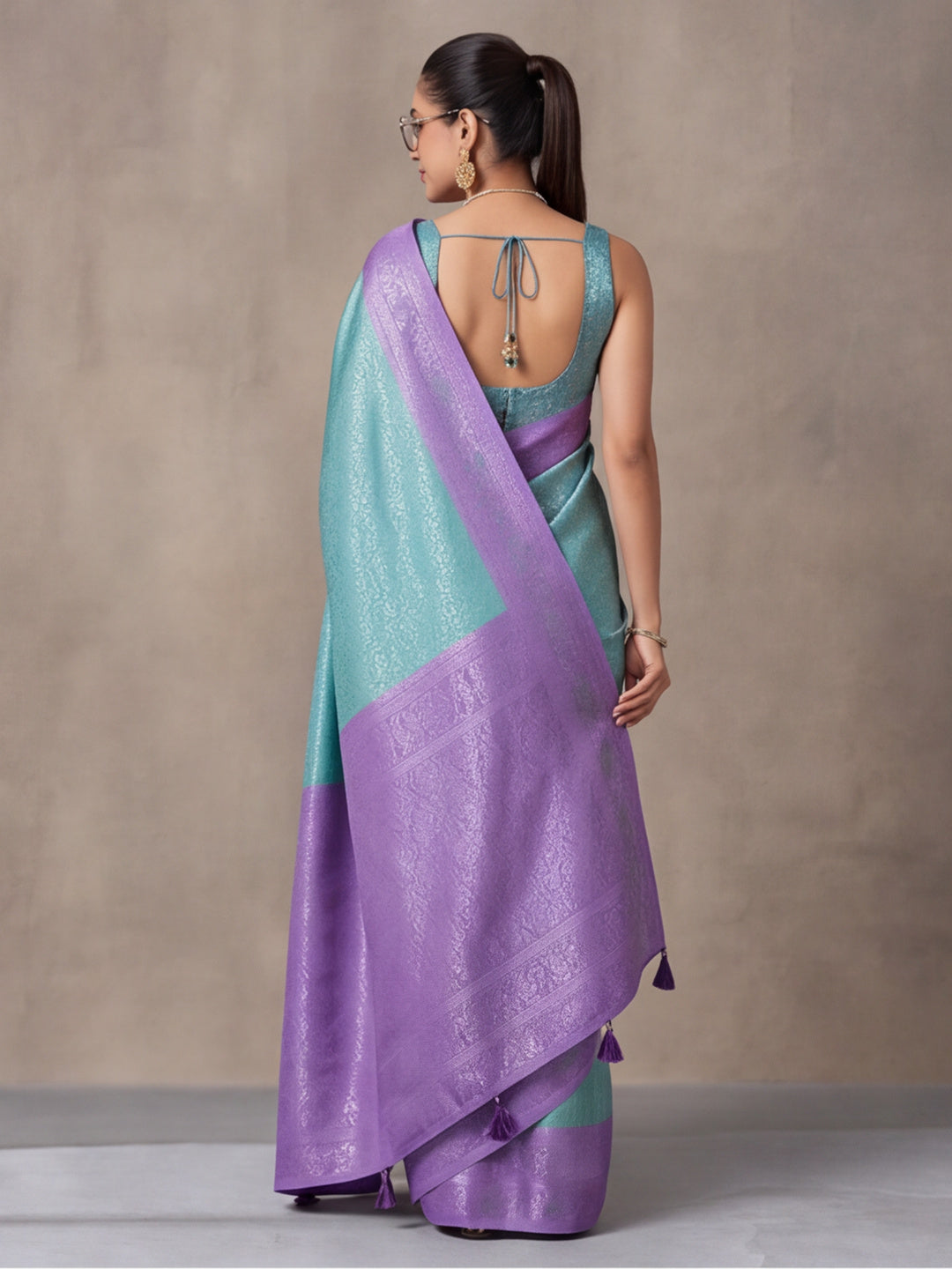 Women Sea Green Jacquard Woven Saree with Rich Ethnic Border and Tassel Detail
