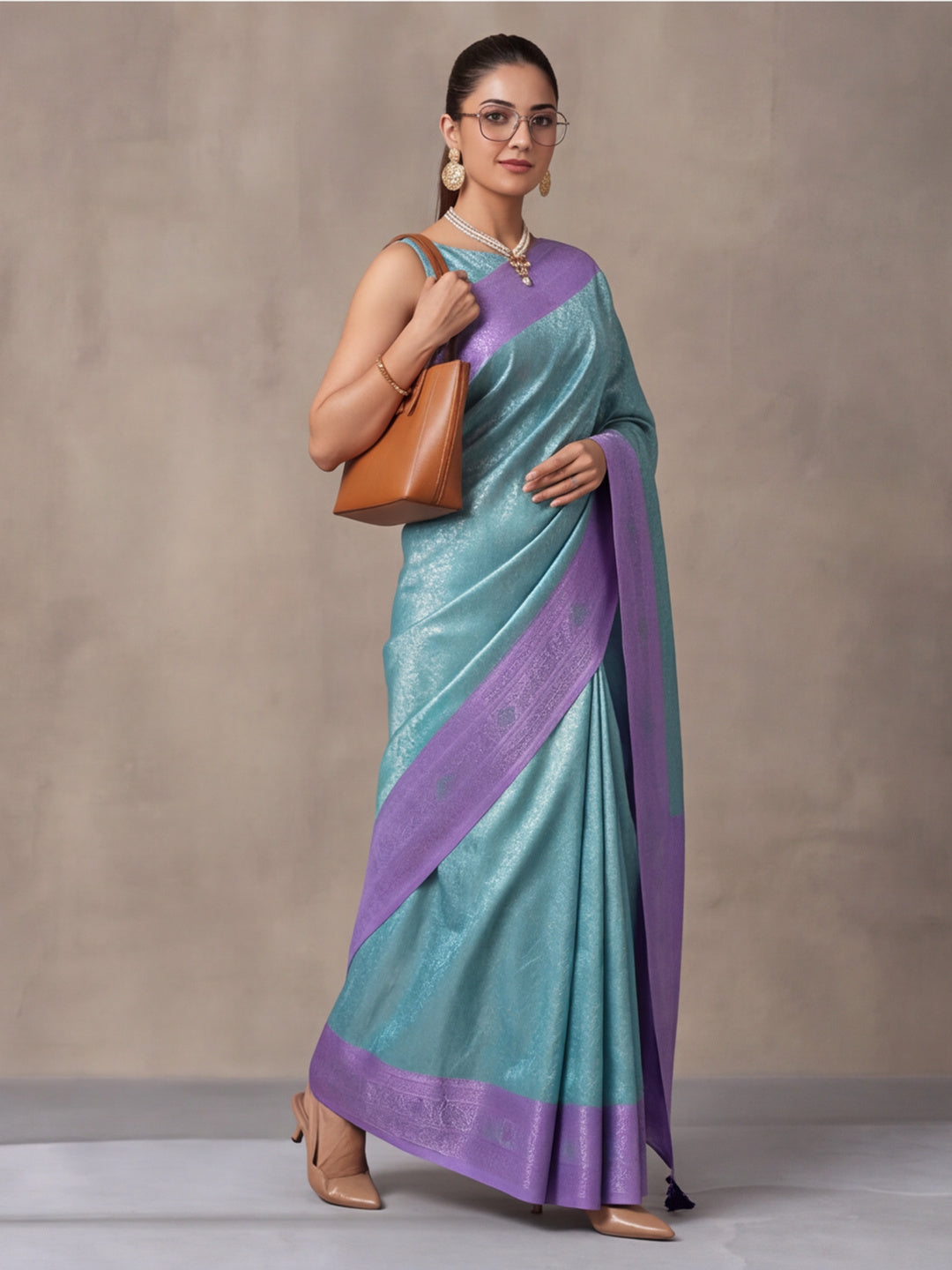 Women Sea Green Jacquard Woven Saree with Rich Ethnic Border and Tassel Detail