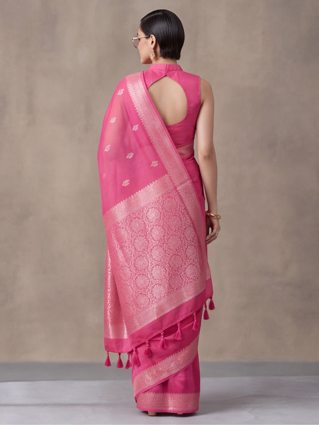 Women Fuchsia Pink Woven Saree with Zari Butti Work and Rich Tassel Pallu