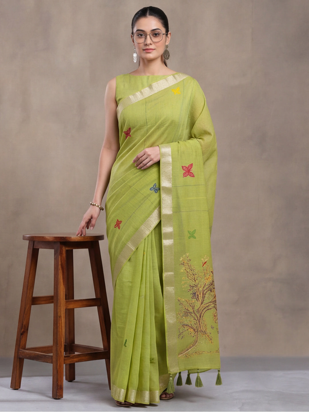 Women Green Designer Weaving Work Saree with Tree Motif Pallu and Tassel Detail