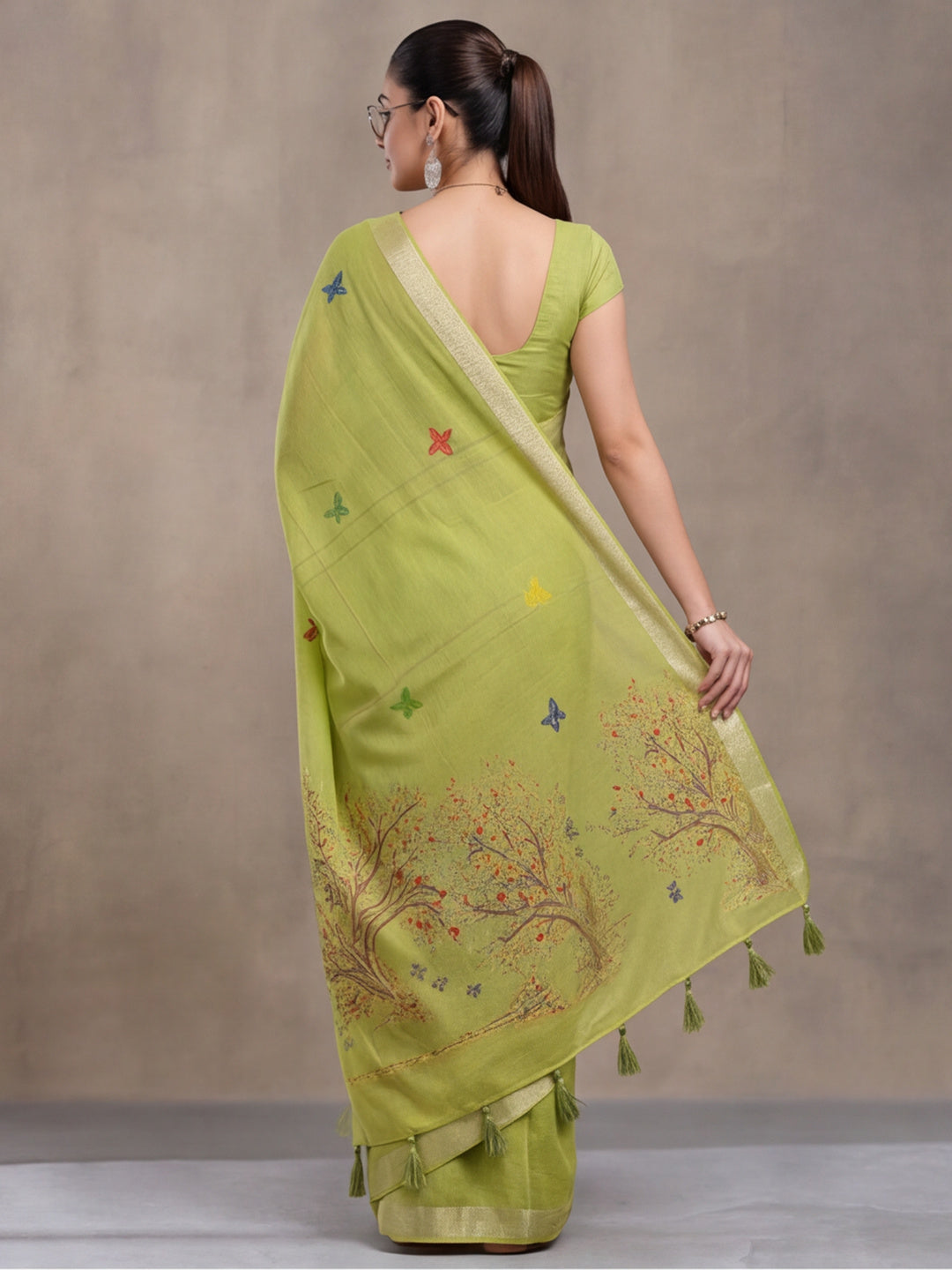 Women Green Designer Weaving Work Saree with Tree Motif Pallu and Tassel Detail