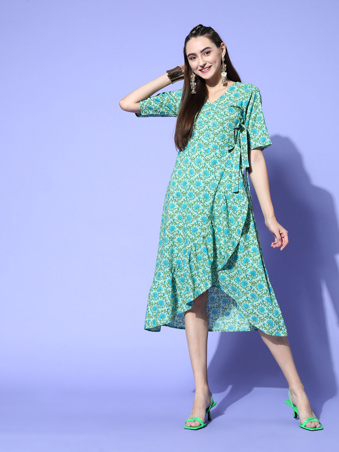 Green Floral Printed Cotton Embroidered Angrakha Style Dress, Has A Front Opening, Has a V neck, Short Regular Sleeves, Tie-Up At The Waist And A Frill On The Front, Has A Flared Hem