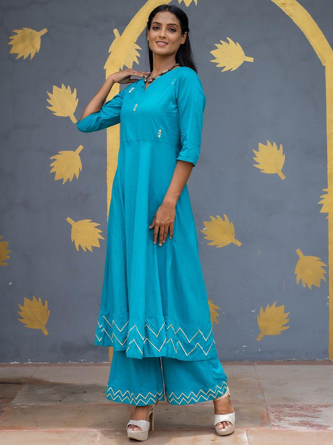 Turquoise Solid Embroidered Cotton Flared Kurta With Palazzos